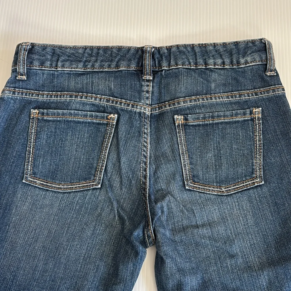 Old Navy bootcut blue jeans.  Girls size 12 plus